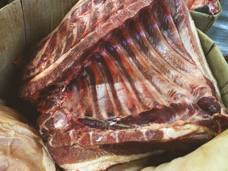 Pork or beef ribs. A large piece of meat on the counter of the store. Fresh pork ribs. Barbecue productの写真素材