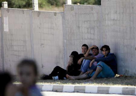 Pastrogor, Bulgaria, September 25, 2013 - Syrian refugees take a rest at a detention center on September 25, 2013 in Pastrogor, Bulgaria のeditorial素材