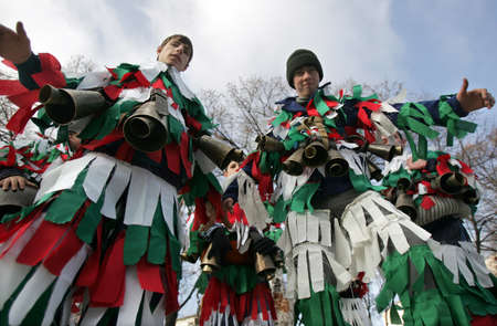 PERNIK, BULGARIA - JANUARY 26  Two boys in traditional masquerade costumes are seen at the the International Festival of the Masquerade Games  Surva on January 26, 2008 in Pernik, Bulgaria のeditorial素材