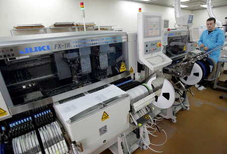 BOTEVGRAD, BULGARIA - FEBRUARY 25  Workers assembling electronics in diode factory, Feb 25, 2011,...
