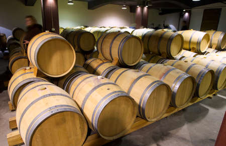 Wine barrels stacked in the old cellar of the winery, Bulgaria.のeditorial素材
