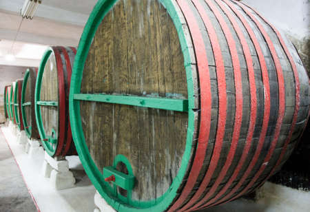 Wine barrels stacked in the old cellar of the winery, Bulgaria.のeditorial素材