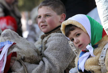 LESNOVO, BULGARIA - JANUARY 8, 2012: Traditional Kukeri players are seen during customary games on January 8, 2012  in Lesnovo, Bulgaria.のeditorial素材