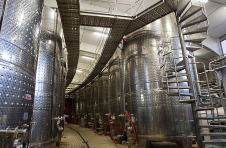 Modern aluminum barrels for wine in wine factory