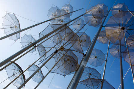 Umbrellas on the waterfront at Thessaloniki, Greece.の写真素材