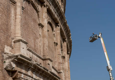 ROME, ITALY - APRIL 7 : The Colosseum in Rome with restore works in progress on the facade. The Colosseum or Coliseum, also known as the Flavian Amphitheatre in Rome, Italy on April 7, 2016.のeditorial素材