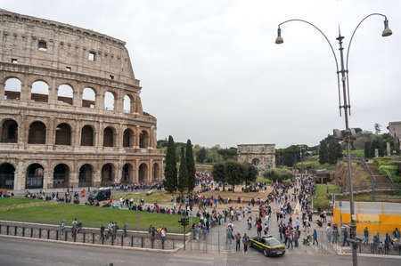 ROME, ITALY - APRIL 7: Colosseum was built in the first century AD by the Emperor Vespasian. Tourists in Rome city on April 7, 2016, Rome, Italy.のeditorial素材