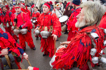 BREZNIK, BULGARIA - JANUARY 21, 2017: Masquerade players called "Kukeri" are seen during customary games on January 21, 2017 in Breznik, Bulgaria.のeditorial素材