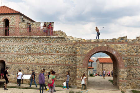 BELCHIN, BULGARIA - SEPTEMBER 3, 2016: Tourists walks arround partly reconstructed roman fortress Cari Mali Grad, near town of Belchin, 3 September, 2016, Bulgaria.のeditorial素材
