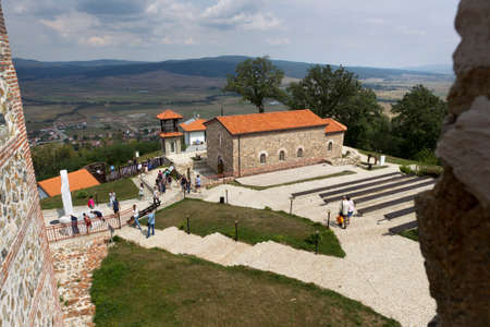 BELCHIN, BULGARIA - SEPTEMBER 3, 2016: Tourists walks arround partly reconstructed roman fortress Cari Mali Grad, near town of Belchin, 3 September, 2016, Bulgaria.のeditorial素材