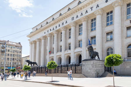 SOFIA, BULGARIA - JUNE 23: People enjoy the sunny weather in front of Sofia Court House in Sofia, Bulgaria on June 23, 2018.のeditorial素材