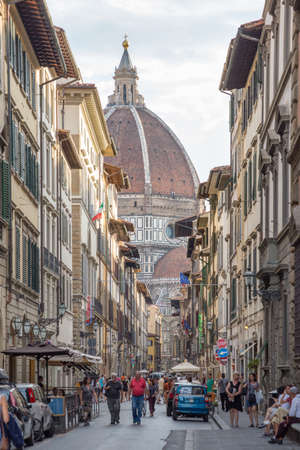 ITALY - FLORENCE - SEPTEMBER 4: People enjoy their way to the Cattedrale di Santa Maria del Fiore (Cathedral of Saint Mary of the Flower) in Florence Italy on September 4 2018.のeditorial素材