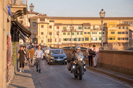 ITALY - FLORENCE - SEPTEMBER 4: River Arno and famous bridge Ponte Vecchio in Florence, Tuscany, Italy on September 4 2018.のeditorial素材