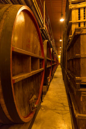 Wine barrels in cellar in Italy, Tuscan.のeditorial素材