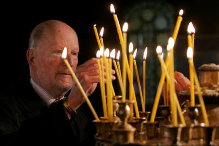 BULGARIA, SOFIA - MARCH 28: Bulgarian ex-prime minister and monarch in exile Simeon Saxe-Coburg-Gotha, during a Palm Sunday mass on March 28, 2010 in St. Alexander Nevsky Cathedral, Sofia, Bulgaria.のeditorial素材