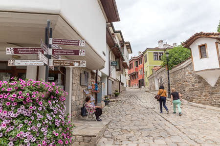 PLOVDIV, BULGARIA, JUNE 18, 2021: People enjoying the sunny weather in Plovdiv downtown, Bulgaria.のeditorial素材