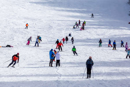 BULGARIA, SOFIA, VITOSHA - FEBRUARY 4: People have fun during a skiing in Vitosha mountain, near Sofia, on February 4, 2022.のeditorial素材