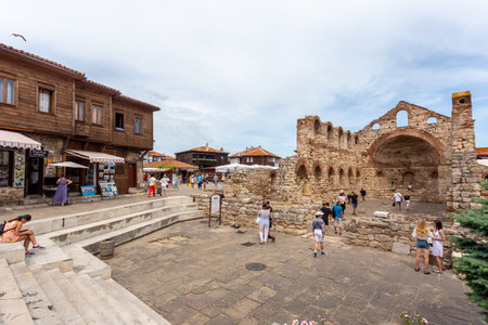NESSEBAR, BULGARIA - JUNE 17: Tourists walk arround The Church of Saint Sofia (aka Old Bishopric) at the Nessebar old city, UNESCO World Heritage Site at the Black Sea coast, Bulgaria.のeditorial素材