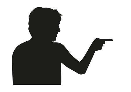 Silhouette. A shadow. The stencil. The man points with his finger. Pointing man.のイラスト素材