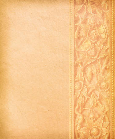 Old worn paper with decorative ornamentの写真素材