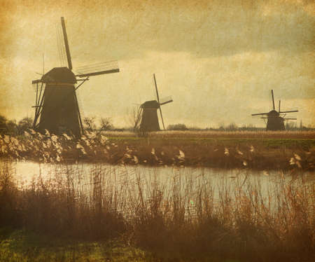 Mill Network at Kinderdijk-Elshout, Netherlands.  Photo in retro style. Paper texture.の写真素材