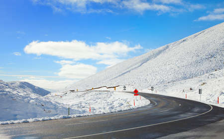 Road Through Snowy Mountains  Crown Range Road, South Island, New Zealandの写真素材