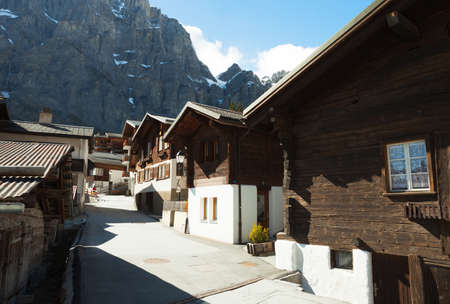 Old street in Leukerbad in sunny day, canton of Valais , Switzerland.の写真素材