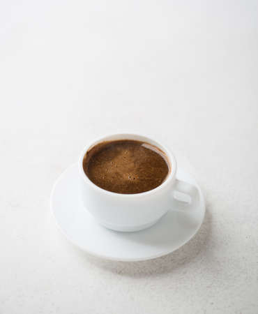 Cup of coffee on old rustic  table.の写真素材