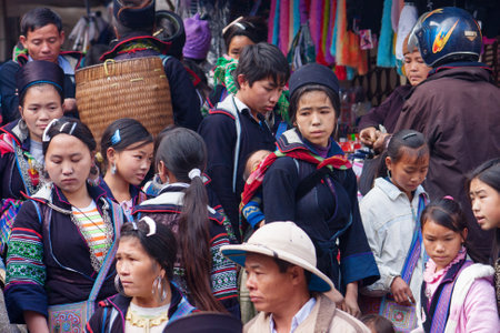 Sa Pa,  Vietnam - January 03, 2010: Black Hmong  ethnic minority peoples in the market , Sa Pa, Lao Cai Province, North Vietnam.のeditorial素材