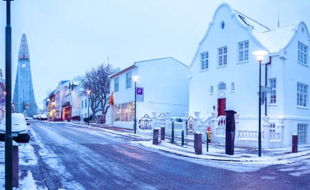 Old street  in   Central Reykjavik at twilight, Iceland.  in the background church of Hallgrimur.