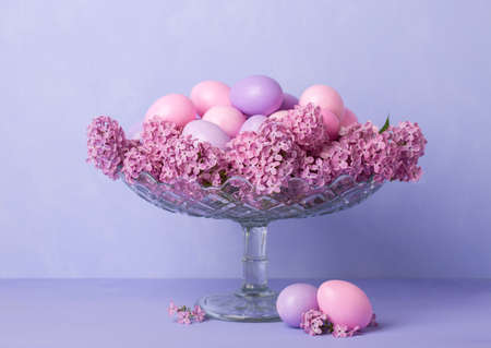 Retro still life with Easter eggs and flowers of Lilac.