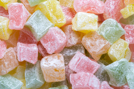 Closeup of multicolored cubes Turkish delight (Lokum). Selective Focus. Flat lay.の写真素材