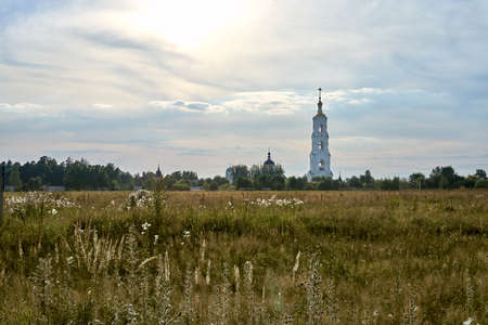Monastery bell tower, field in the foregroundの写真素材