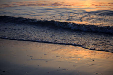 Sea Sunrise with Clouds and Waves