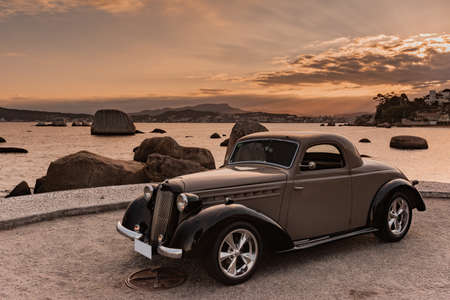 vintage car 1951 at sunset.のeditorial素材