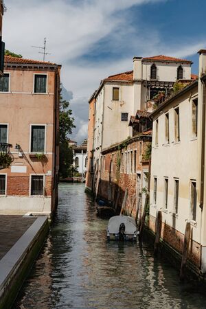 Canals of Venice during the day in high resolution, vertical orientation.の写真素材