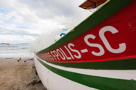 moored fishing boats, at the bottom of the sea with more boats, Florianopolis, Brazil.の写真素材