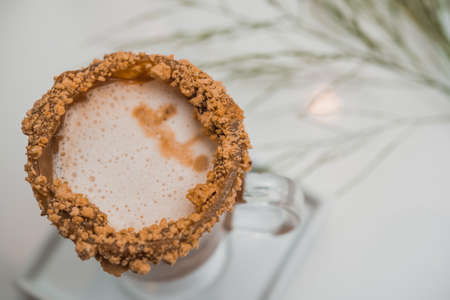 special coffee cup with cream and spices on light background, selective focusの写真素材
