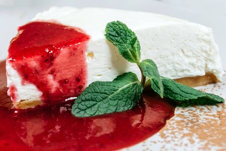 Ice cream with strawberry jam and herbsの写真素材