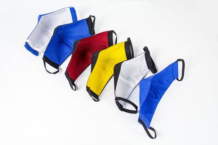 six colored medical masks on a white backgroundの写真素材