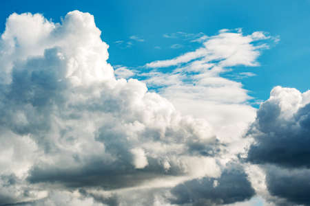 Landscape of large clouds on a blue summer skyの写真素材