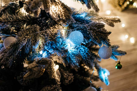 Christmas tree with garlands and toys closeupの写真素材