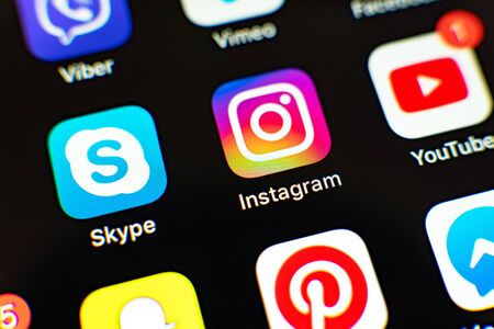 Miami / USA - May, 02, 2019: Apple iPhone X with icons of social media - instagram, pinterest,...