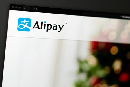 Miami / USA - 04.28.2019: Alipay company website homepage. Close up of Alipay logo. Can be used as a website for websites, good for info, business or marketing concept.のeditorial素材