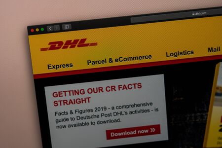 Tallinn/Estonia - September 27, 2019: DHL company website homepage. Close up of DHL logo. Can be used as illustrative for news media or  business and marketing concept.のeditorial素材