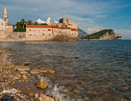 Castle like view on the Budva, Montenegro old town from the seaの写真素材