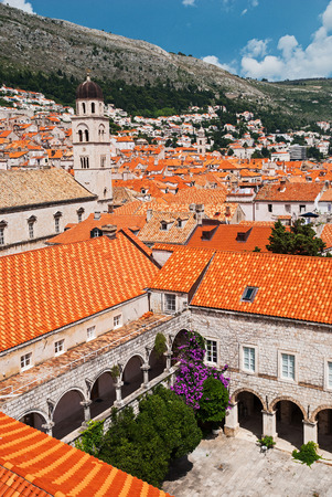 Dubrovnik, Croatia city view with red roofs overlooks the mountains with beautiful private yard in foregroundのeditorial素材