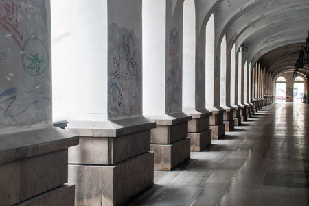 Geometry shapes made of passage and columns and light coming throughの写真素材