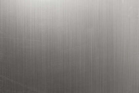 Stainless steel background texture with scratches and abrasion marks