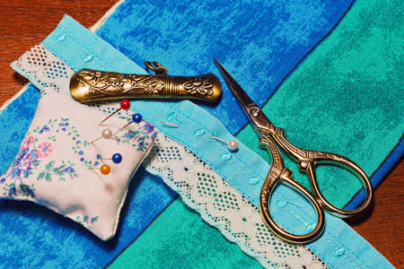 Different sewing instruments in retro style and materials for handicraftのeditorial素材